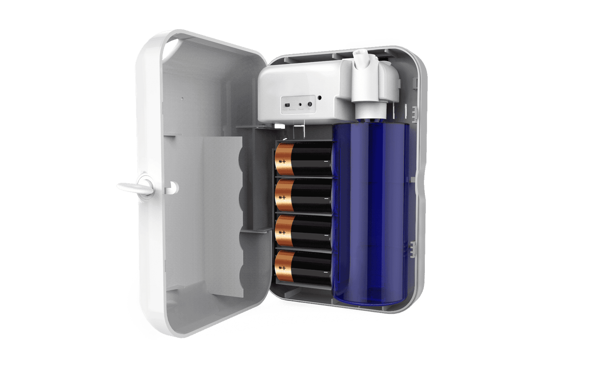 Interior view of Air Esscentials scent diffuser showing battery compartment and aroma oil bottle
