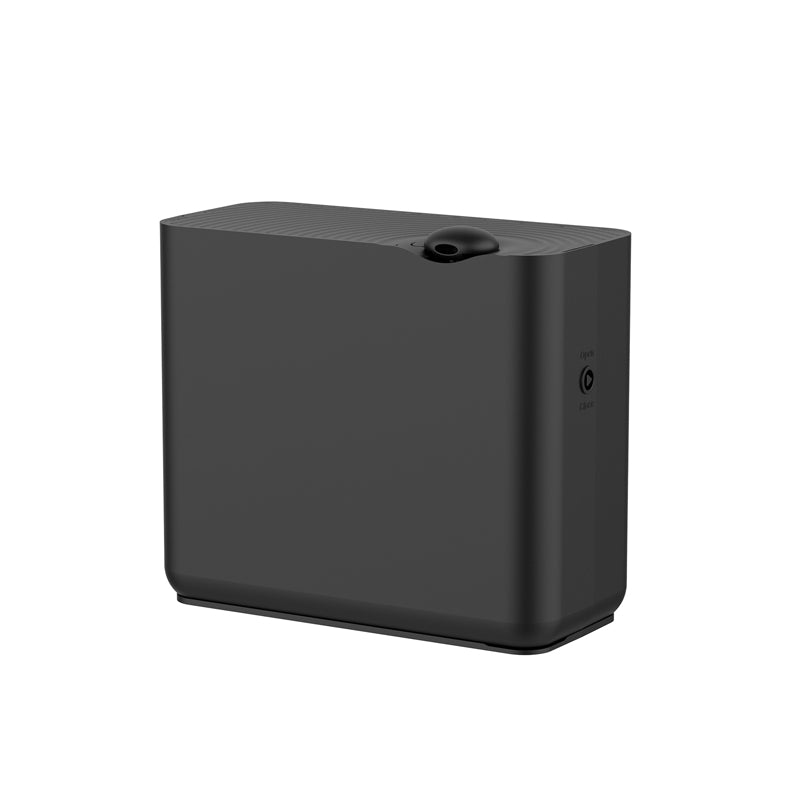 Black Air Esscentials scent diffuser machine, side view showing power button