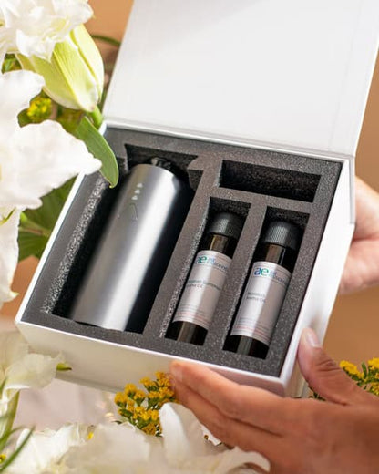 Air Esscentials scent diffuser gift set with two aroma oil bottles in a white box