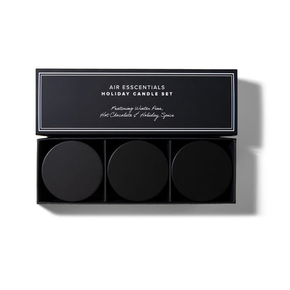 Air Esscentials Holiday Candle Set open box with three black candles: Winter Pine, Hot Chocolate & Holiday Spice